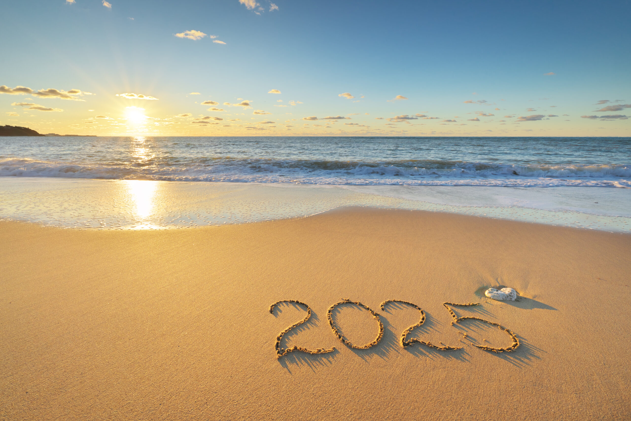 2025 year on the sea sand beach shore during sunset. 2025 year on the sea sand beach shore during sunset. Element of design.