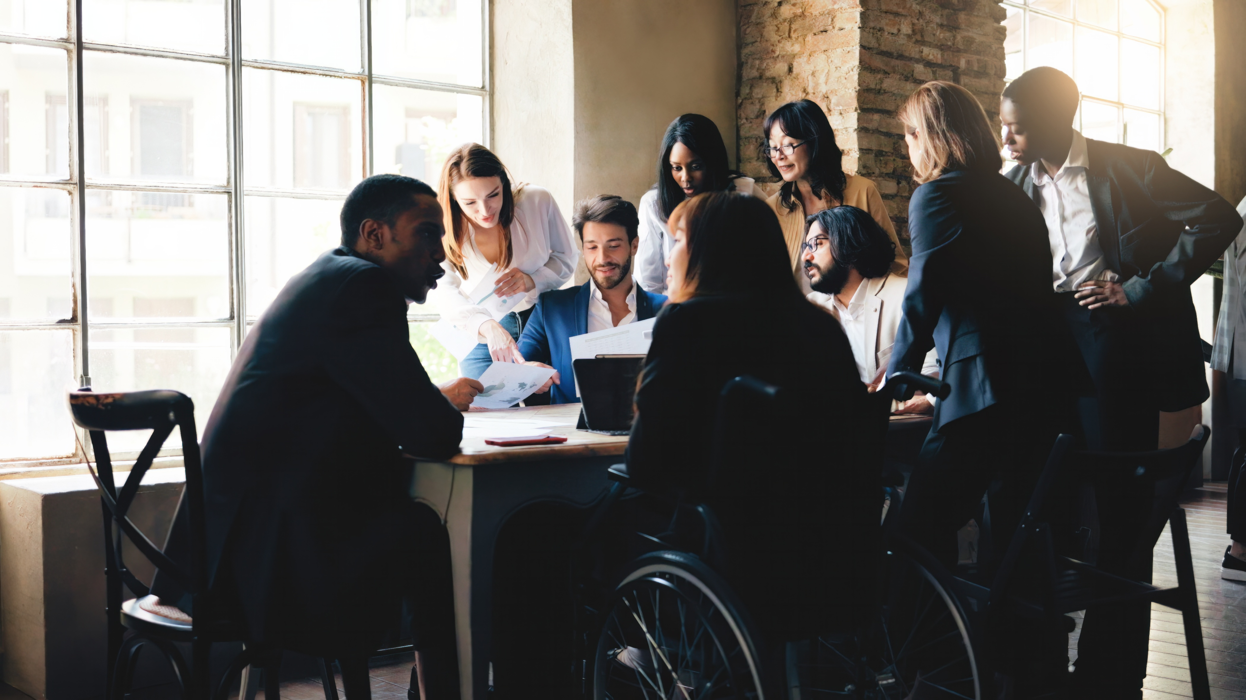 Business group of people working at team meeting. Multiethnic colleagues inside bank workplace Business group of people working at team meeting. Multiethnic colleagues inside bank workplace