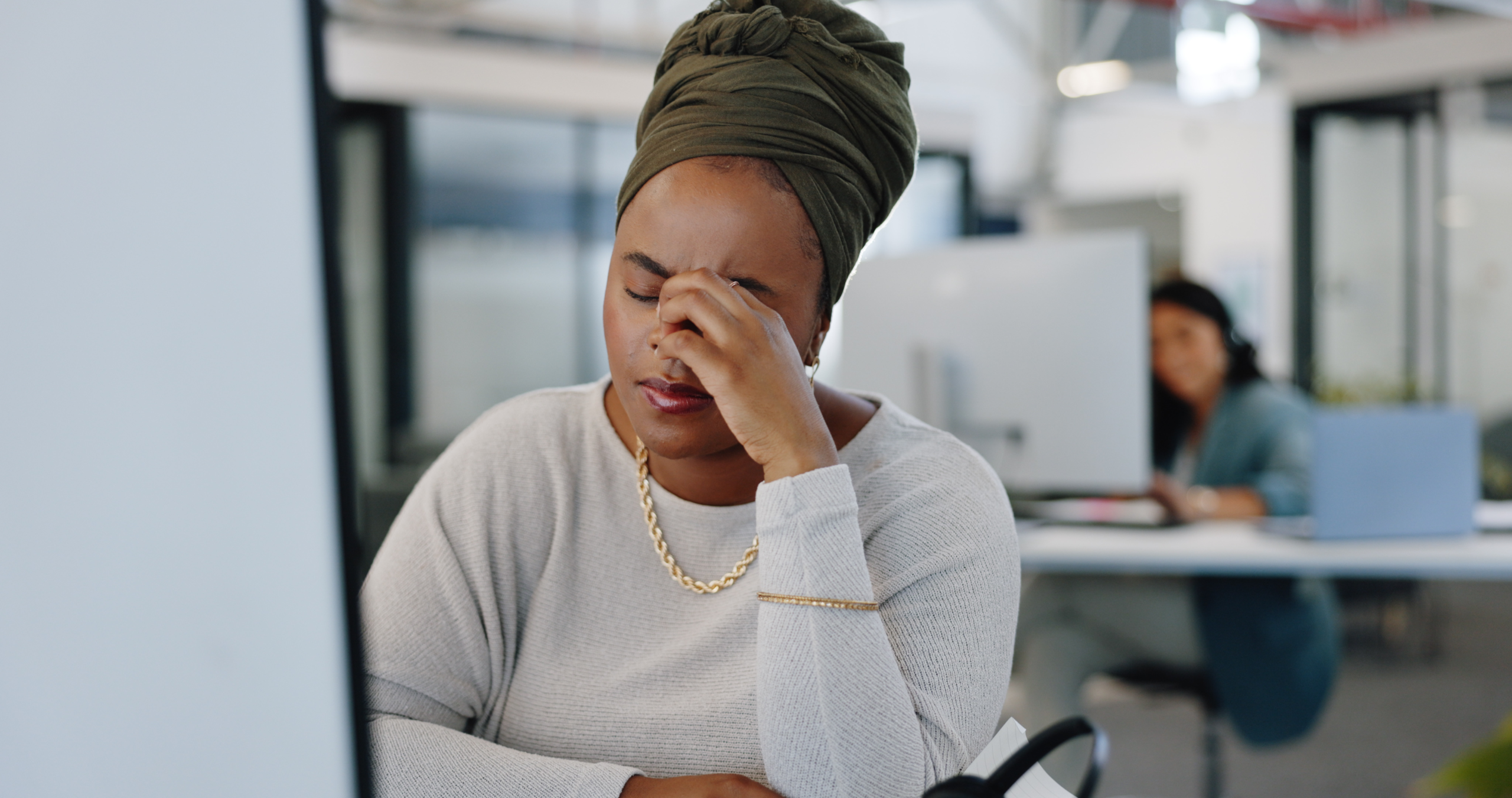 call-center-stress-and-black-woman-with-headache-2026-01-09-11-02-13-utc Call center, stress and black woman with headache working in customer support, sales or crm. Burnout.